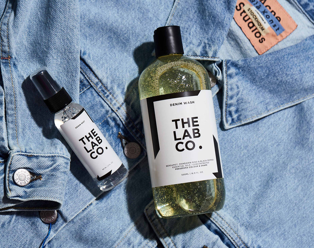 TLC DENIM RANGE LAID ON TOP OF AN ACNE STUDIOS DENIM JACKET