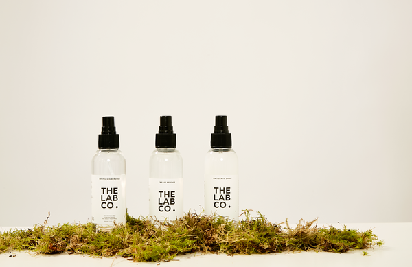 The Lab Co. Treatment Mists lined up next to each other on top of a mound of moss